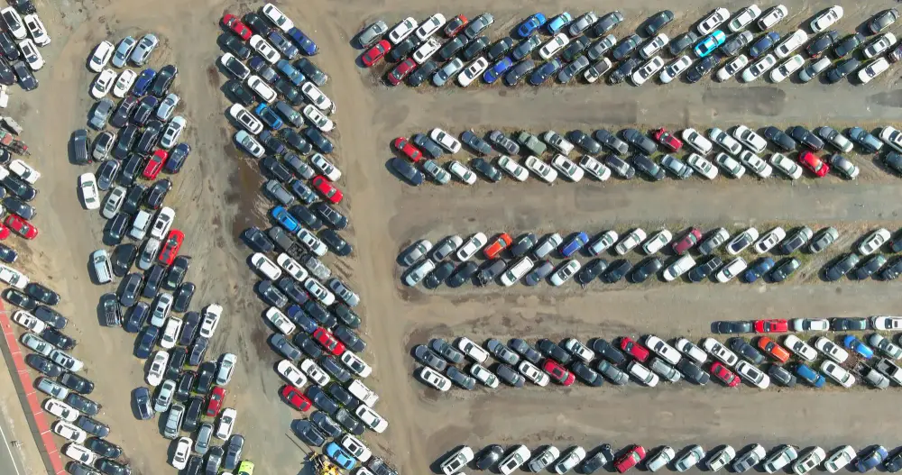 aerial view in parking auction dealer lot used many cars terminal